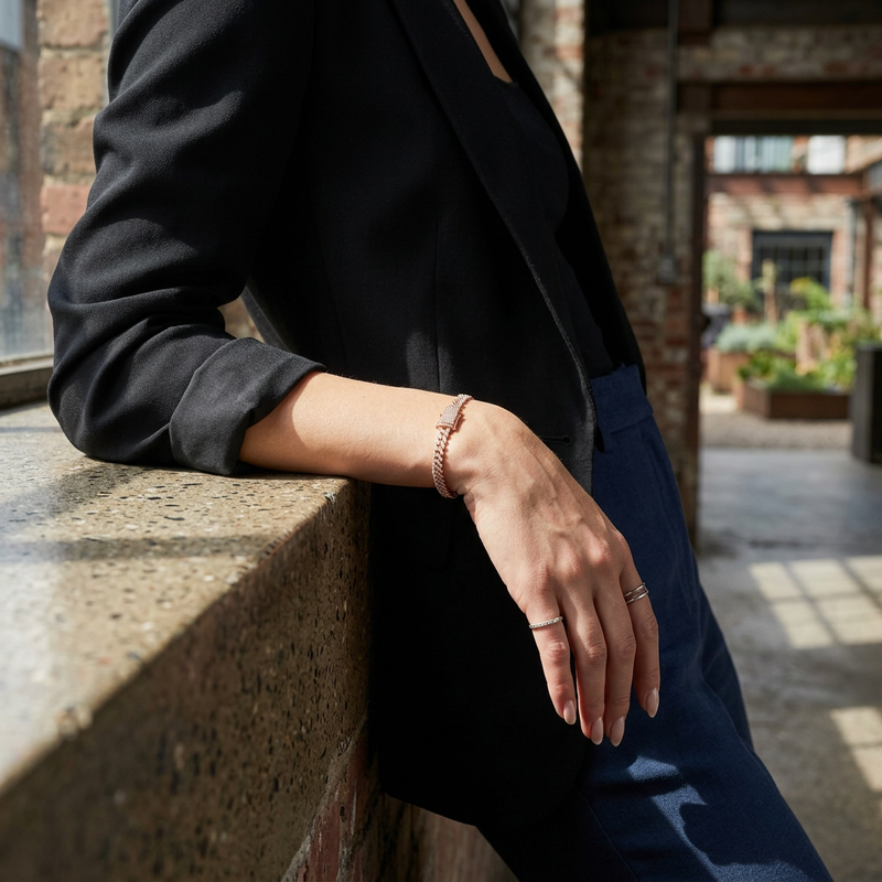 Close-up of diamond link Cuban bracelet in 10k rose gold on female model, high-resolution, trendy editorial style.