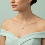 A studio shot with an HDR lighting setup from a Sony A7R IV camera with a 90mm macro lens at f/4 to capture detailed textures of the necklace. The female model stands against a minimalist pastel mint backdrop, dressed in an elegant pastel mint off-shoulder