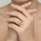 soft studio light image with female model wearing Miravyn ring. Make the ring appear smaller than it is.