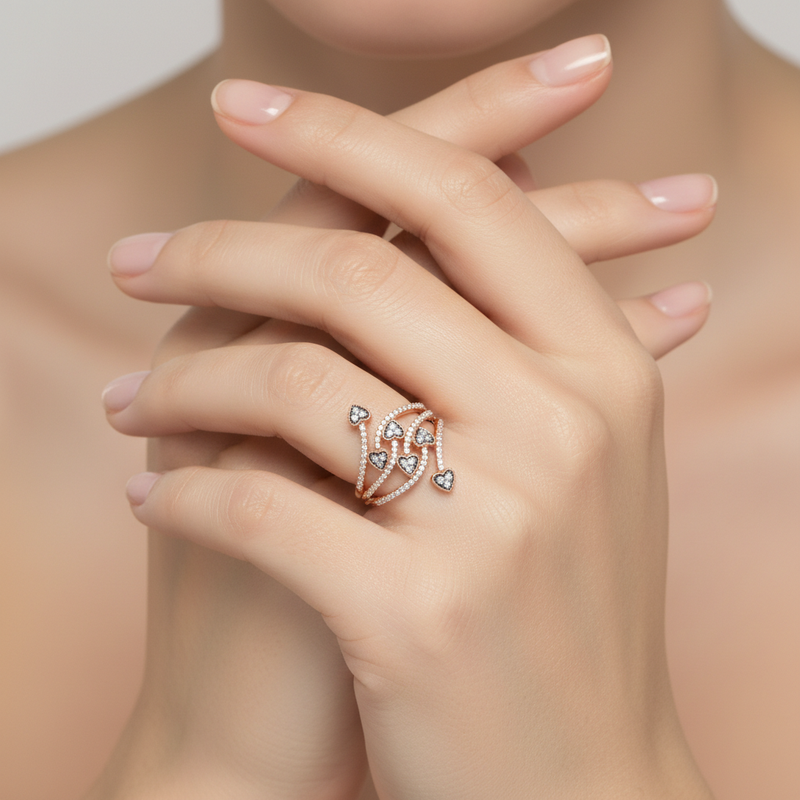 soft studio light image with female model wearing Miravyn ring. Make the ring appear smaller than it is.
