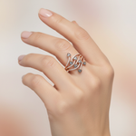 soft studio light image with female model wearing Miravyn ring. Make the ring appear smaller than it is.