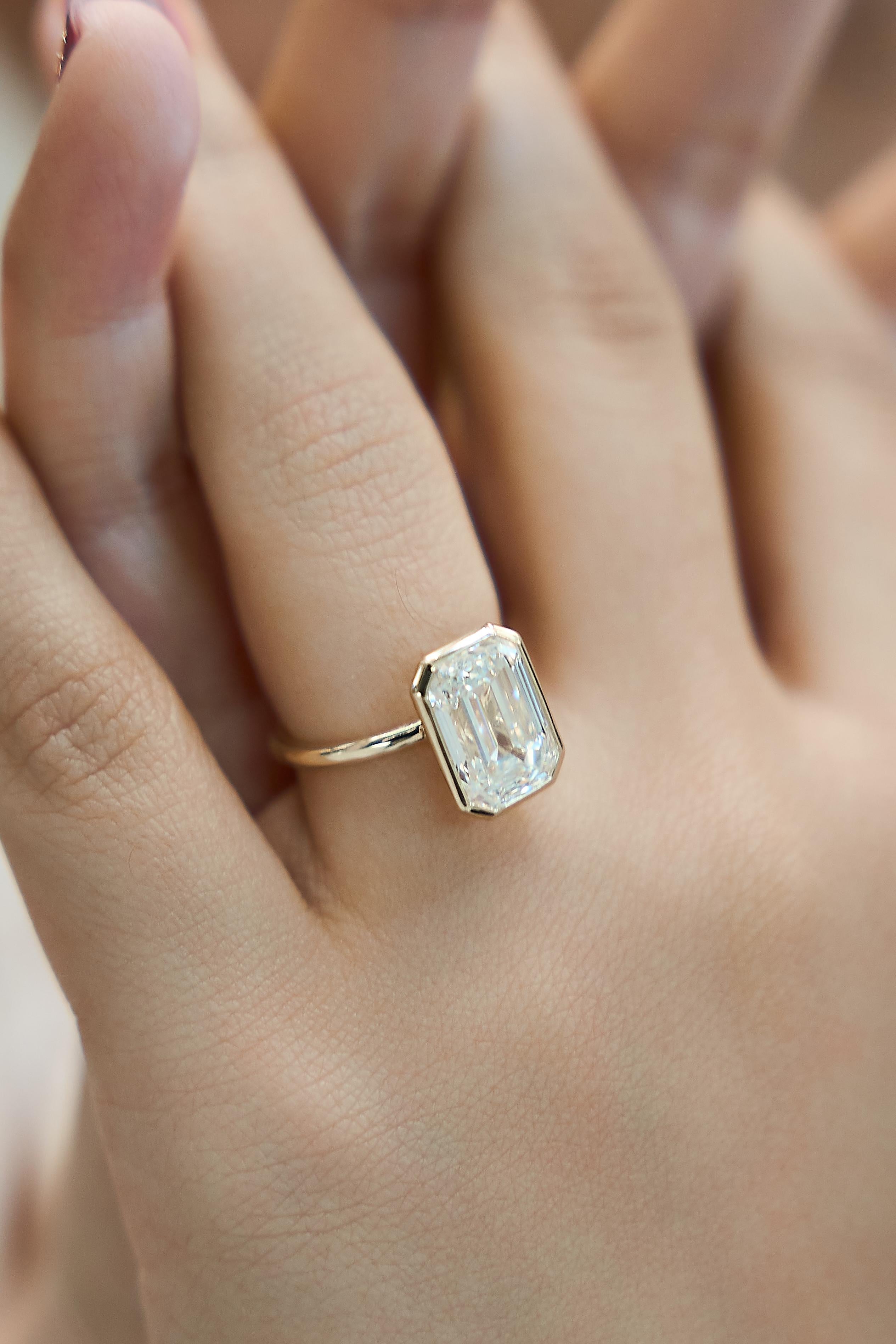 Solaire 14K Yellow Gold Emerald Cut Lab Grown Diamond Bezel Solitaire Engagement Ring – 5 cts