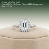 A high-resolution, close-up shot of the Czarina 14K white gold emerald cut lab grown diamond halo engagement ring, captured with a softbox lighting setup to accentuate the brilliance and clarity of the 1.75 ct. center diamond. The ring is positioned on a s