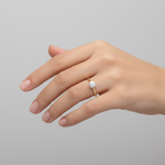 female hand model image, studio setting scene. round solitaire diamond is 6 mm diameter. make the ring smaller than it is
