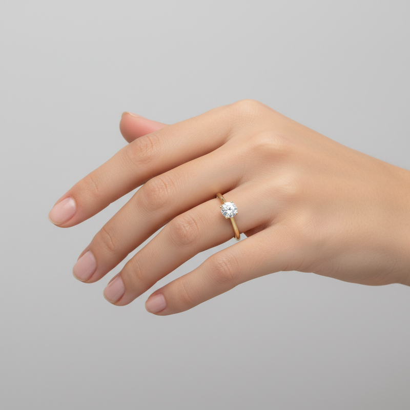 female hand model image, studio setting scene. round solitaire diamond is 6 mm diameter. make the ring smaller than it is
