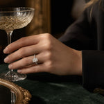 Close-up of Maia 14K white gold lab-grown diamond engagement ring with hidden halo and side stones.