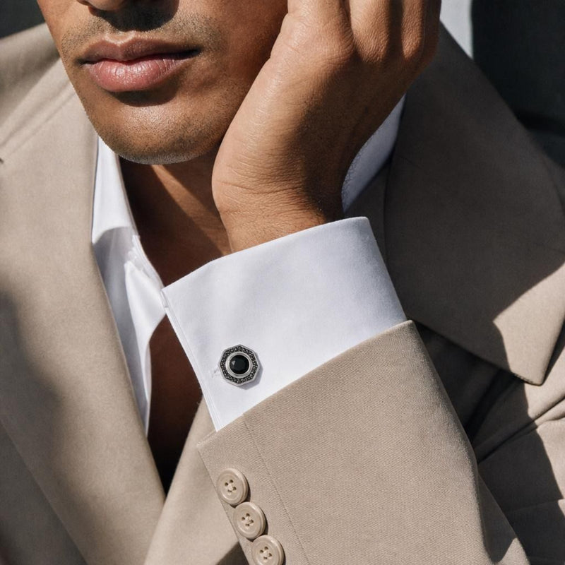 Octagon black spinel cufflink set in 925 sterling silver worn on a white French cuff shirt sleeve.