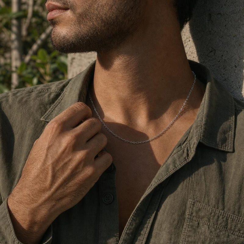 Yozora sterling silver alternating rolo chain necklace worn on a man in an olive green shirt.